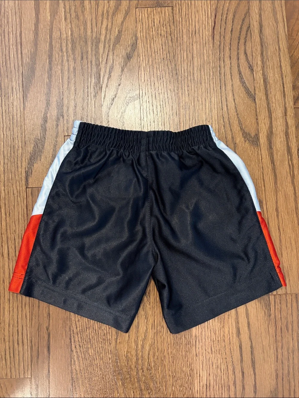 Toddler Boys Nike Kids Black Athletic Shorts with Orange & White Accents
